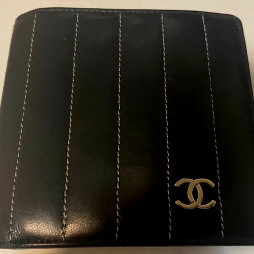 Chanel Lambskin Vertical Quilted Mademoiselle Bi-Fold Wallet